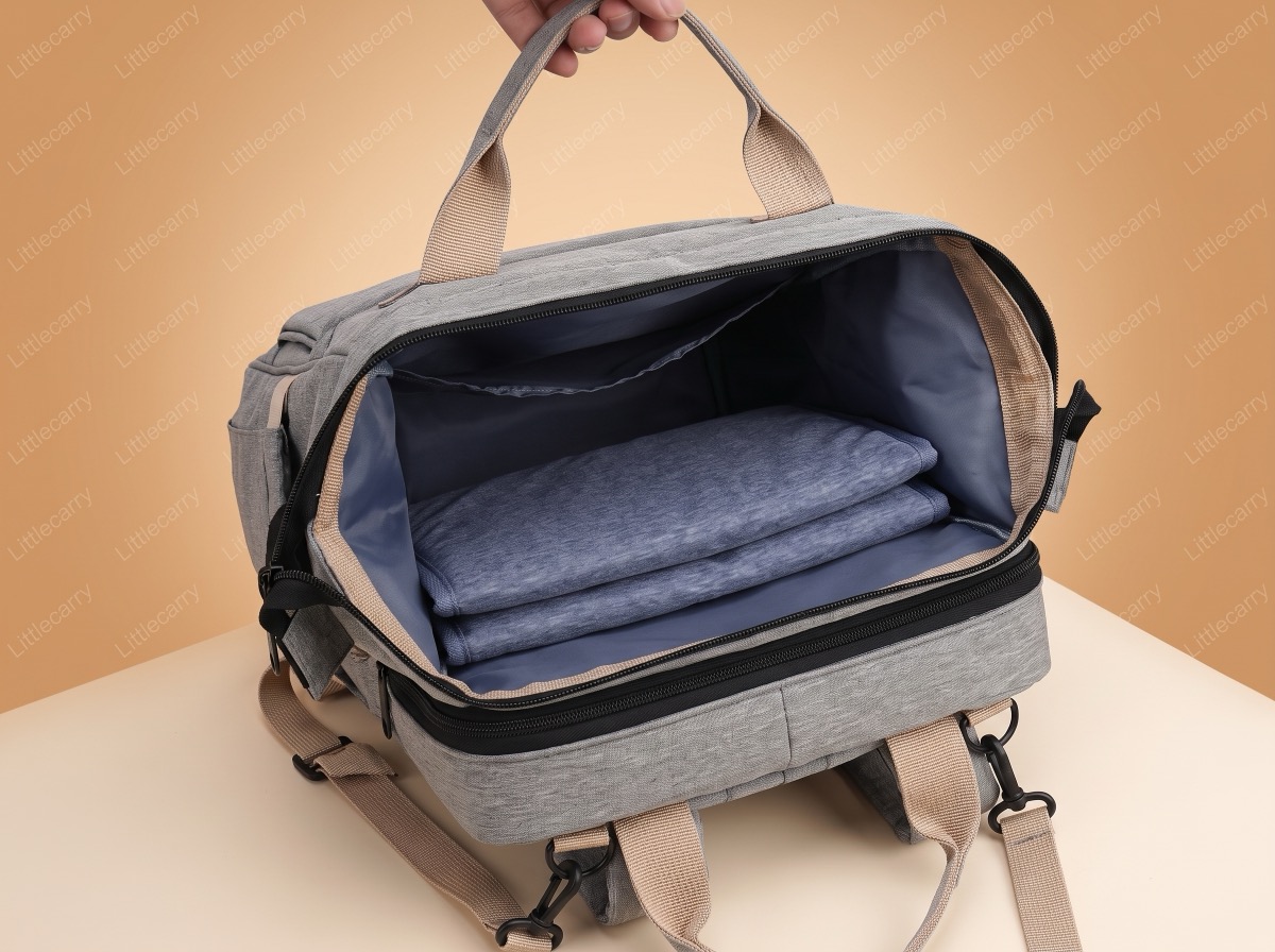 Interior LittleCarry Baby Bag — bassinet pad terlipat di dalam